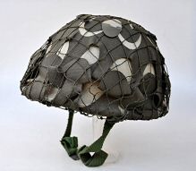 Iraqi variant ballistic fibre helmet with camo net.JPG